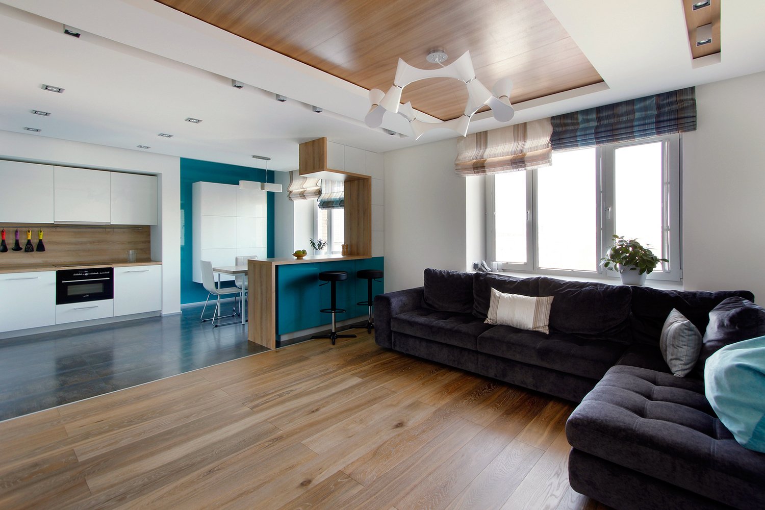 Modern living room with clean decor and organized space after professional cleaning.